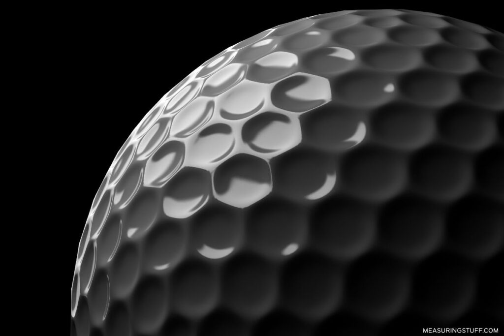closeup of golf ball dimples