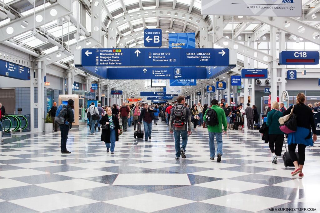 passengers walking through O'Hare airport, Chicago