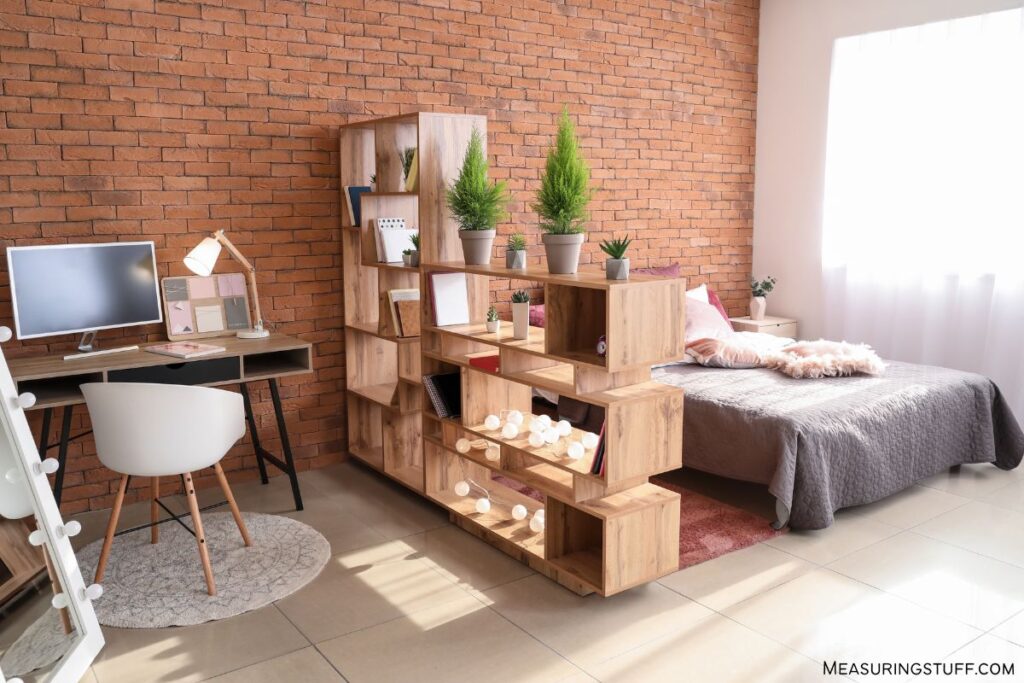 small apartment with brick wall
